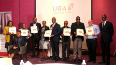 UBA Kenya unveiling the Braille Account Opening Forms. PHOTO/COURTESY